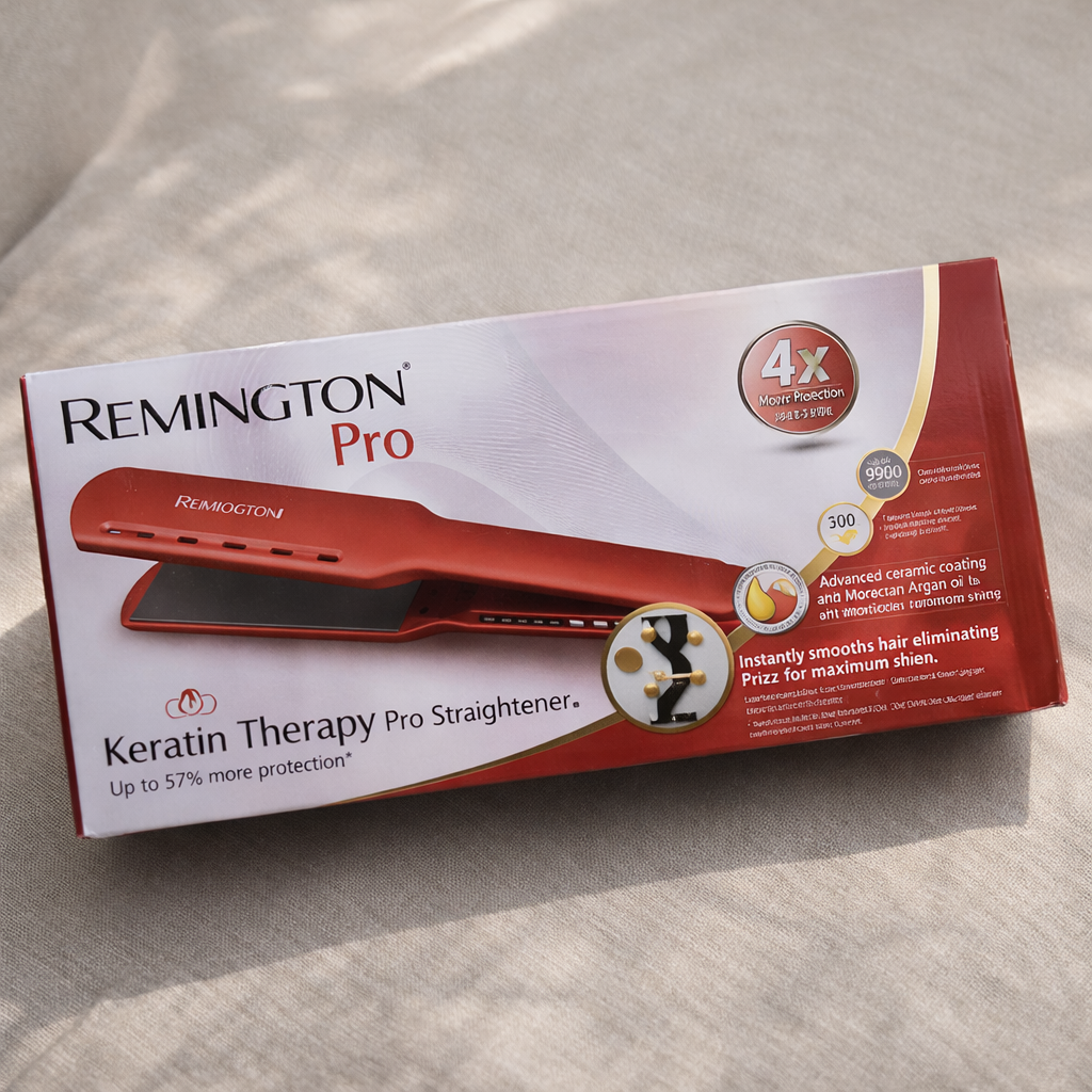 Remington Pro Keratin Therapy Pro Straightener packaging on a beige surface